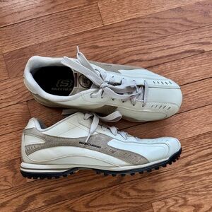 Golf shoes are Cream and Gray Sneakers with Sporty Design